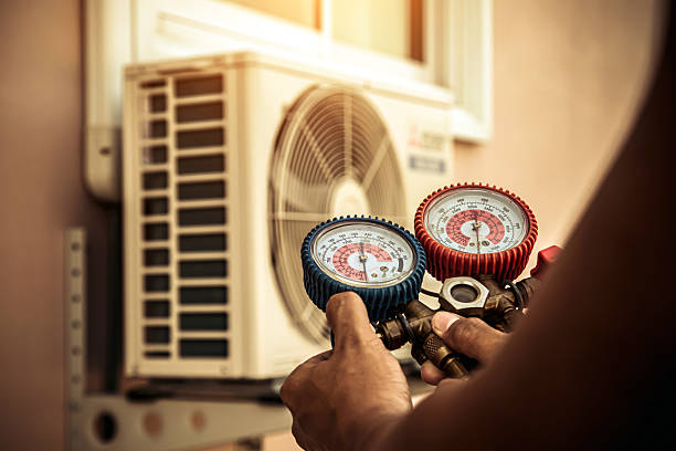 Professional Emergency Hvac technician working in Towson, MD
